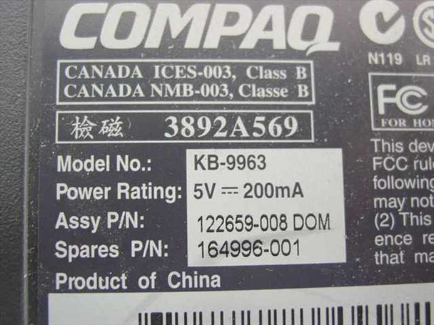 Compaq KB-9963 bottom label showing model number, power rating 5V 200mA, part numbers 164996-001 and 122659-008