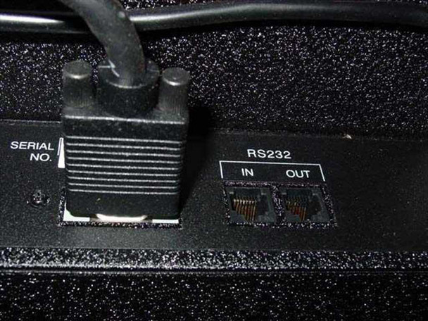 Clarity VN-3820-VA rear panel detail showing serial number port and RS-232 IN/OUT RJ-style connectors