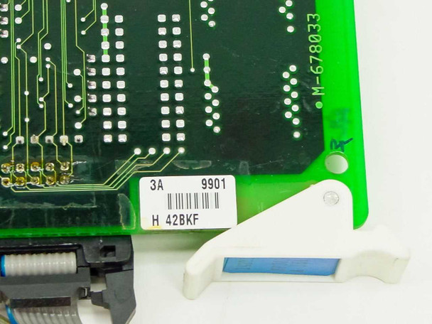 NEC PA-24DTR board corner close-up showing barcode label 3A 9901 H 42BKF and PCB marking M-678033 with white card ejector tab