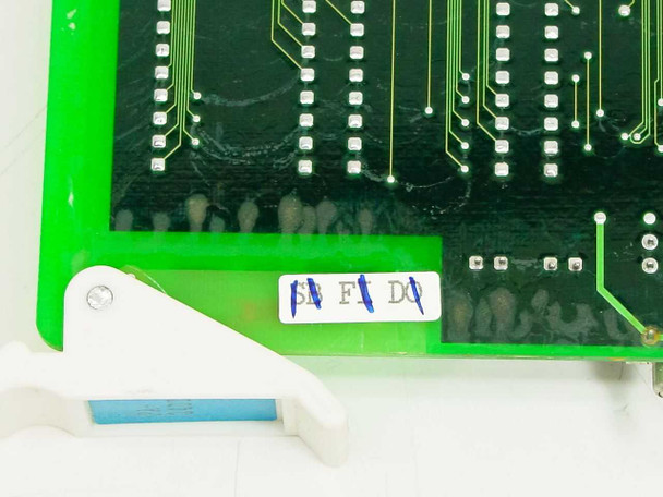 NEC PA-24DTR PCB corner detail showing handwritten blue marker label and white plastic card ejector tab