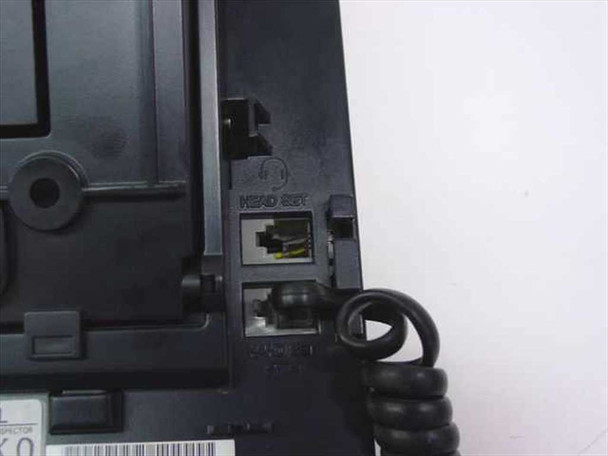 NEC DTU-8-1 — underside port detail showing HEAD SET jack and additional modular connector with coiled handset cord