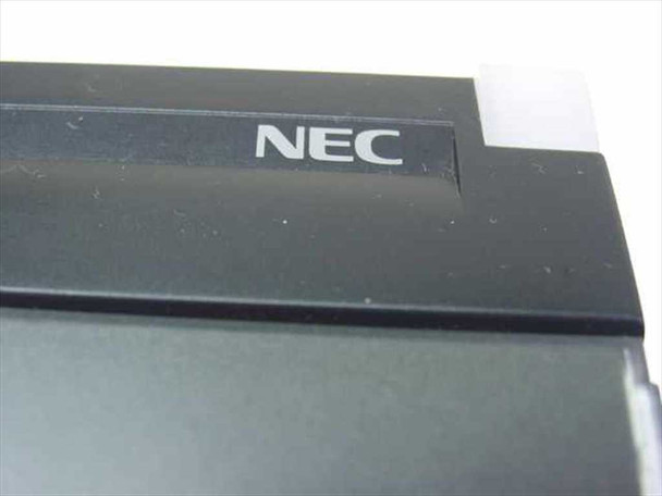 NEC DTU-8-1 phone — close-up of NEC logo on top of handset cradle