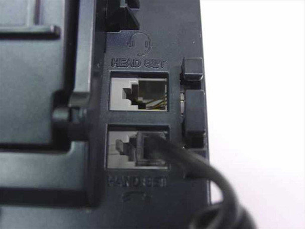 NEC DTU-8D-2 phone base – close-up showing dedicated headset RJ jack and handset RJ jack with coiled cord connected