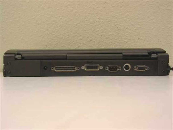 Compaq Contura 430C 2860C laptop rear port panel showing parallel port, VGA, DB9 serial, audio jack, and second DB connector