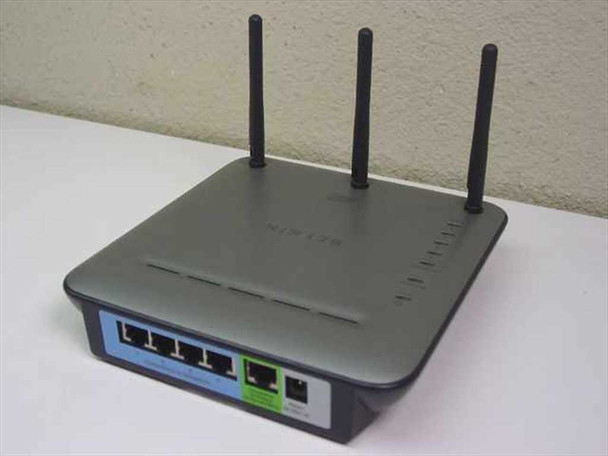 Belkin F5D8230-4 Wireless Pre-N Router – front three-quarter view showing three antennas, Belkin branding, and rear port panel with LAN and WAN ports