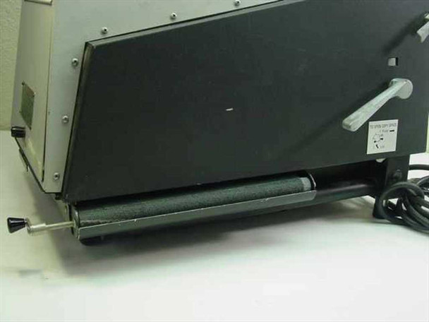 Beseler VU-LYTE III 12300 — underside and document stage detail showing stage belt, adjustment crank, and front leg area