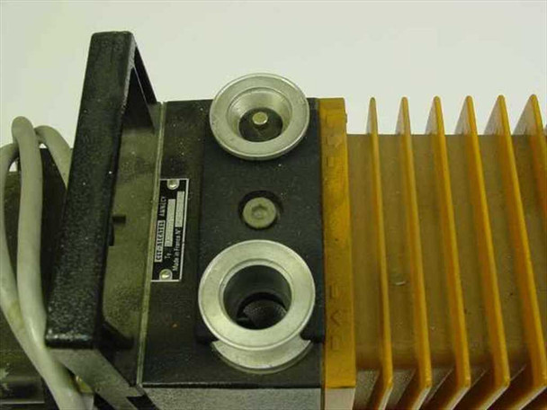 Alcatel CIT-Alcatel 2004A vacuum pump — close-up of top port area showing two NW/KF flanged inlet and outlet fittings
