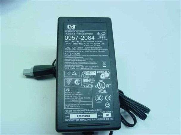 HP AC power adapter 0957-2084 label showing input 100–240V AC and output specifications