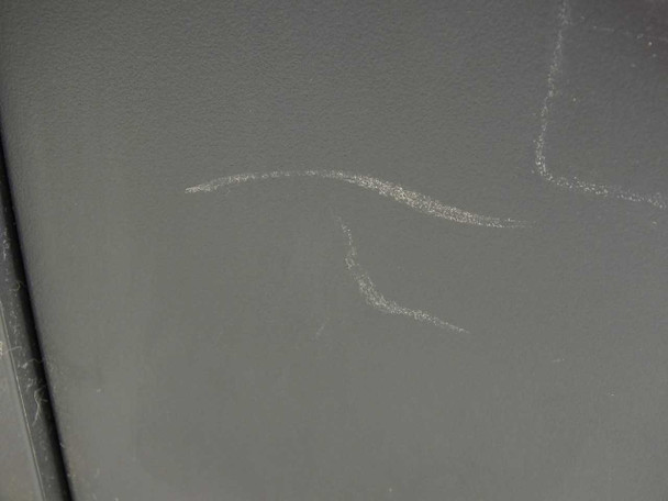 HP OfficeJet 5510 close-up of scratches on the dark gray side panel