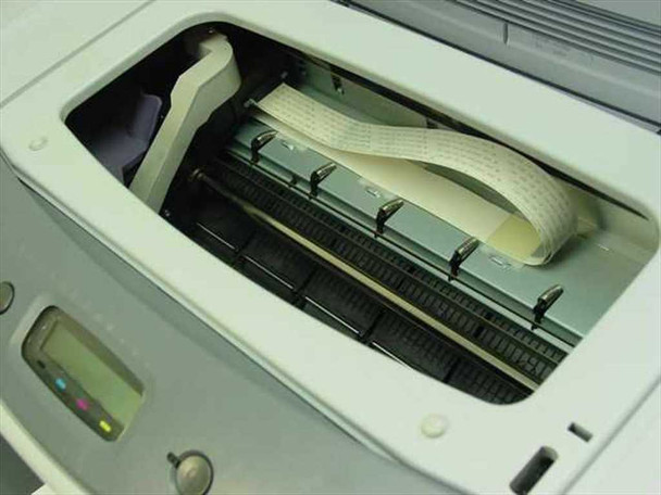 HP CP 1700 C8108A color inkjet printer – top open interior view showing printhead carriage rail, flex ribbon cable, and ink carriage mechanism
