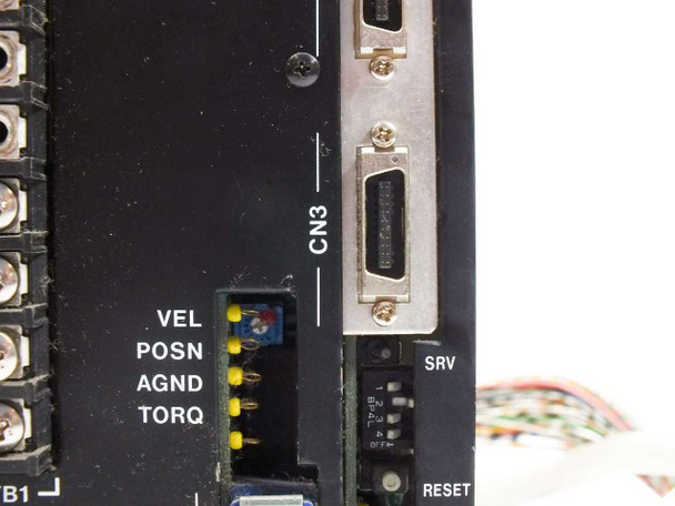 Yokogawa SR1015B82 front panel detail showing CN3 high-density D-sub connector, VEL POSN AGND TORQ analog output pins, and SRV RESET controls