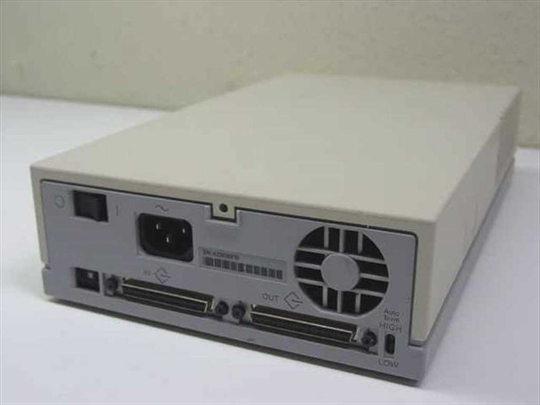 Sun EXB-8050XL tape drive – rear panel showing IEC power inlet, dual 50-pin SCSI Centronics IN/OUT ports, cooling fan, and Auto/High/Low selector switch