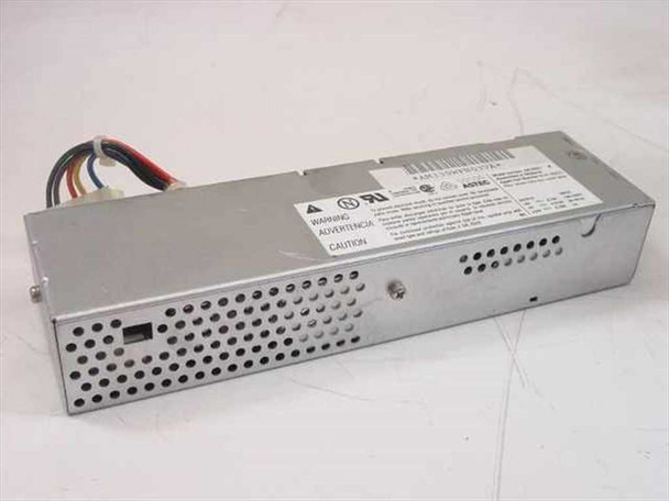Apple 614-0003 Astec AA16251 Mac LC power supply — top and front view showing vented aluminum housing and output wire harness