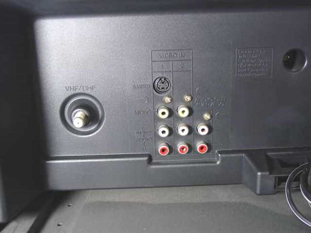 Sony Trinitron KV-32S25 rear input panel showing VHF/UHF antenna port, S-Video input, and dual composite RCA video and audio inputs