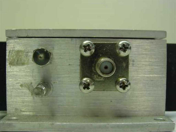 Avantek APG-2052M GaAs FET Amplifier – end panel showing two SMA-style connector ports with mounting screws on aluminum housing