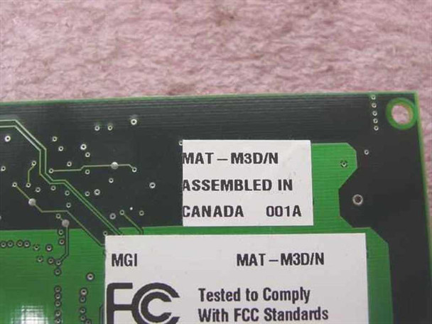 Close-up of Matrox MAT-M3D/N rear label showing MAT-M3D/N part number, Assembled in Canada 001A, MGI MAT-M3D/N designation, and FCC compliance text