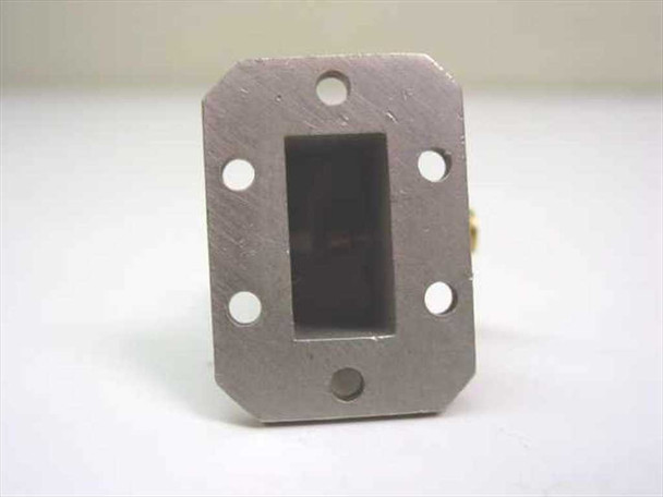 WR75 SMA waveguide adapter — straight-on flange face view showing rectangular WR75 aperture and mounting holes