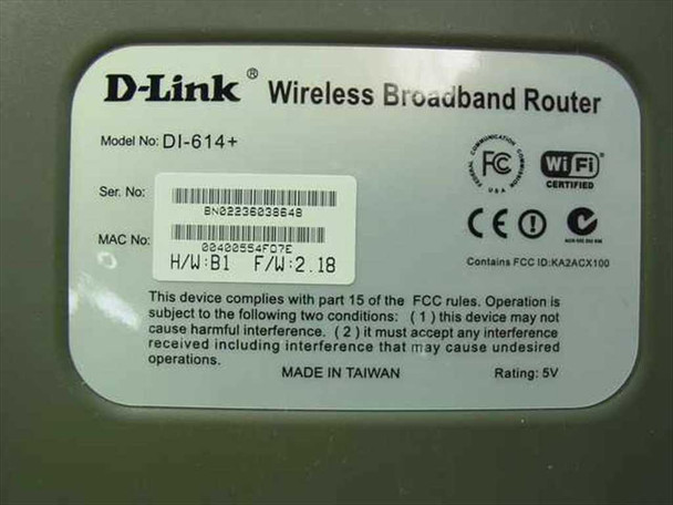 D-Link DI-614+ bottom label showing model number, serial number, MAC address, hardware version B1, firmware 2.18, FCC ID KA2ACX100