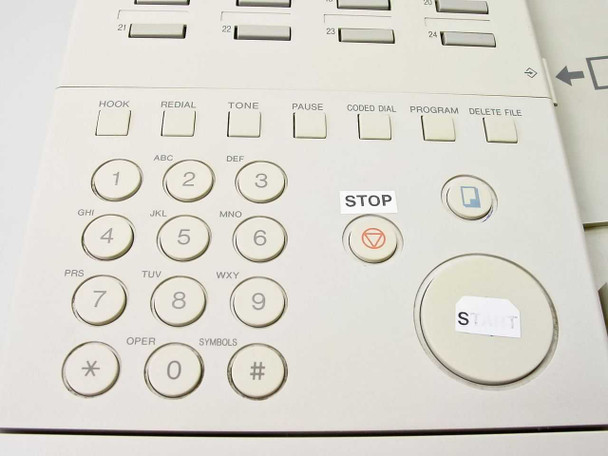 Canon LaserClass 5500 – close-up of numeric keypad showing HOOK, REDIAL, TONE, PAUSE, CODED DIAL, PROGRAM, DELETE FILE function keys and STOP button