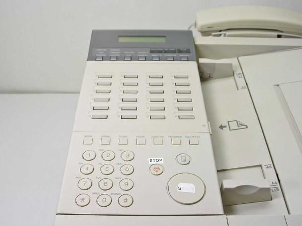 Canon LaserClass 5500 – front panel view showing LCD display, 24 one-touch speed-dial keys, numeric keypad, STOP button, and paper size selector tabs