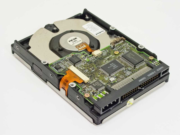 IBM DAQA-32700 hard drive – bottom PCB view showing controller board with ICs, ribbon cable, and IDE connector