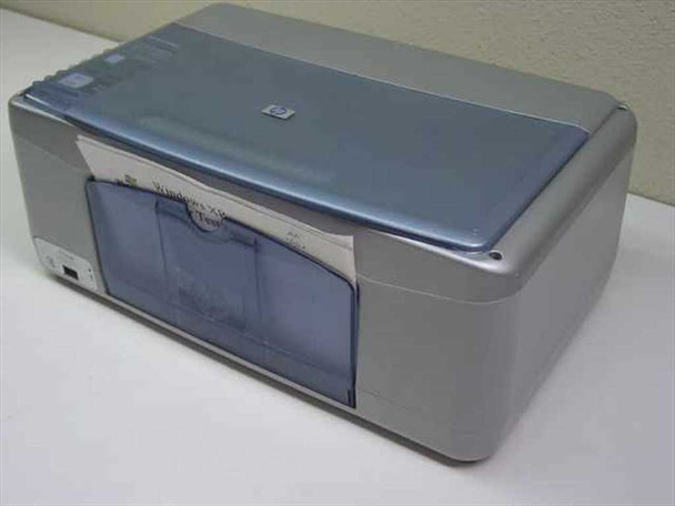 HP PSC 1315xi all-in-one printer — front three-quarter view showing blue scanner lid and paper tray