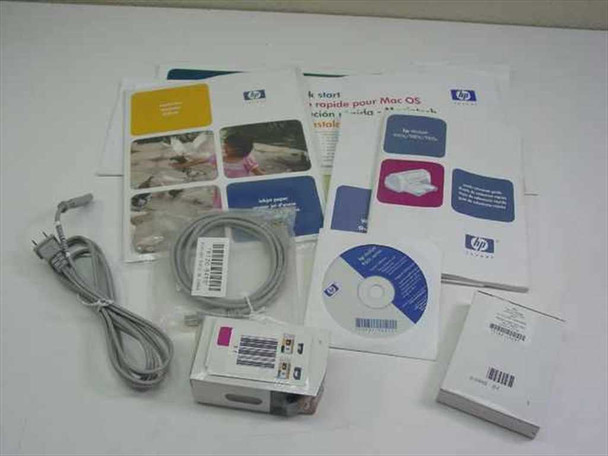 HP Deskjet 960C included accessories — power cable, USB cable, ink cartridge, software CD, quick-start guides, and owner's manual