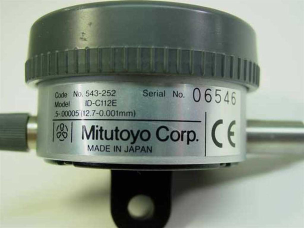 Mitutoyo ID-C112E rear label showing Code No. 543-252, Model ID-C112E, range 5-00005 (12.7-0.001mm), Made in Japan, CE mark, and serial number 06546