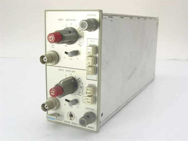 Tektronix 5A38 Dual Trace Amplifier Plug-In Module – front panel with CH1 and CH2 VOLTS/DIV knobs, BNC inputs, and mode selector switches