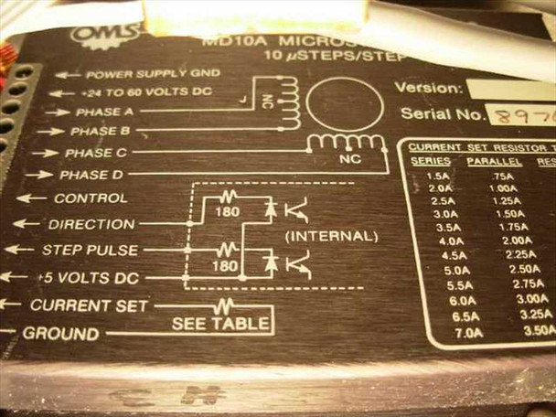 Close-up of Oregon Micro Systems MD10A Microstop Drive label — shows 10 µsteps/step spec, +24 to 60V DC supply range, phase wiring diagram, and current-set resistor table up to 7.0A