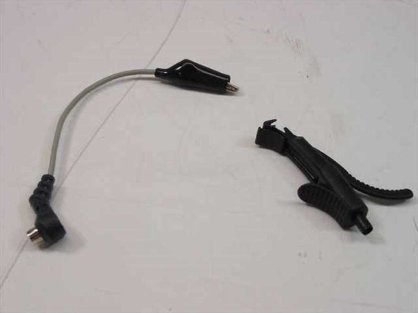 HP 10432A accessories — short ground lead with alligator clip and right-angle connector, plus black probe positioner clip