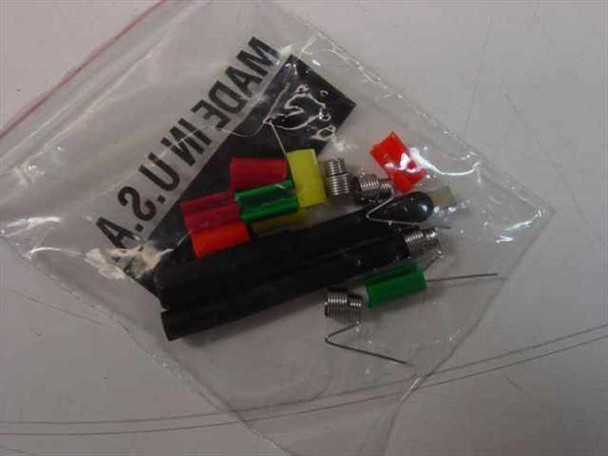 HP 10432A accessory tips bag — sealed bag containing color-coded tip caps, probe tips, ground springs, and replacement tips
