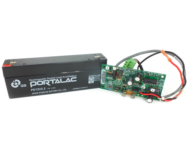 Kronos 8600670-001 Sys 400 Battery Backup Kit — full kit showing GS Portalac PE12V2.2 battery and backup board with harness cables