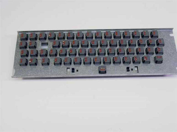 ALPS KCCCA031 keyboard underside with keycaps removed — bare metal plate with ALPS SKCC mechanical switches visible showing orange/red actuator stems and black housings