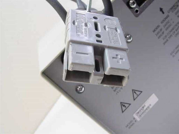 APC SU24XLBP grey Anderson-style 24VDC DC power connector close-up showing positive and negative terminals