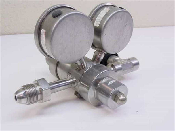 Pacific Scientific 2653 stainless steel regulator rear view showing backs of dual gauges, AN male fitting, and outlet port