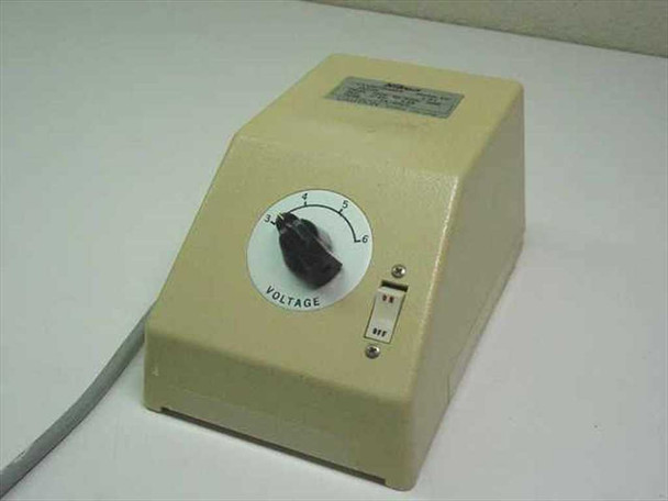 Nikon XN Transformer front-left view showing rotary voltage selector dial (3-6V) and ON/OFF switch with gray AC power cord