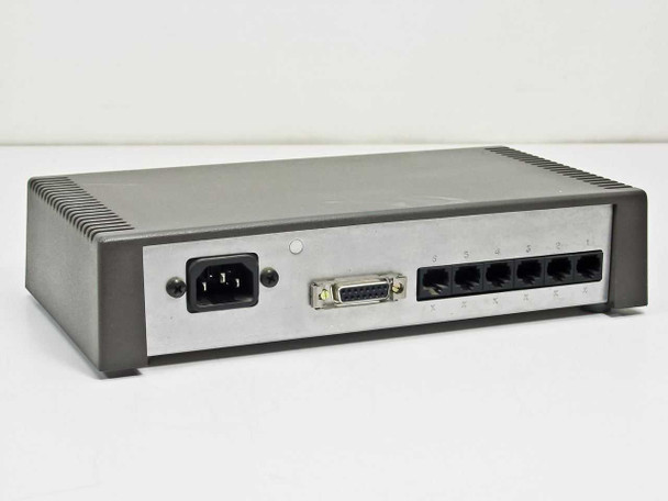 IBM 8222 Ethernet Hub rear panel showing IEC AC power inlet, DB-15 AUI connector, and six RJ-45 ports