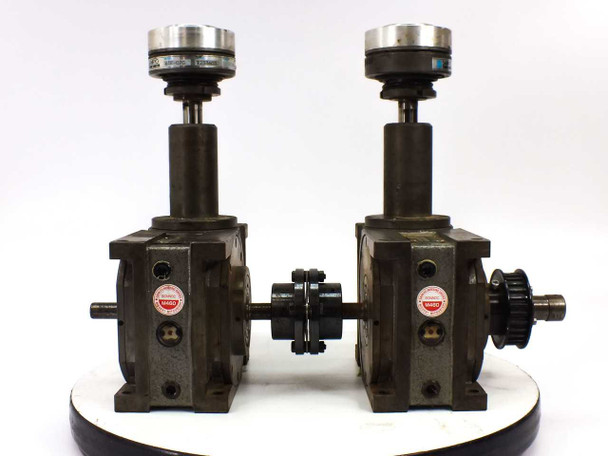 Sandex 7FU indexing drive pair with Sankyo 6TF-07C torque limiters mounted on top — front view showing both units connected by shaft coupling