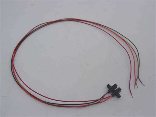 Single Honeywell HOA1881-013 optoswitch unit with full 21-inch red, black, and white pigtail leads laid out on white surface