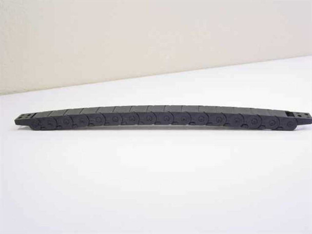 igus 14.2.028 E-Chain cable carrier shown curved in a full arc — side profile view of complete black nylon drag chain
