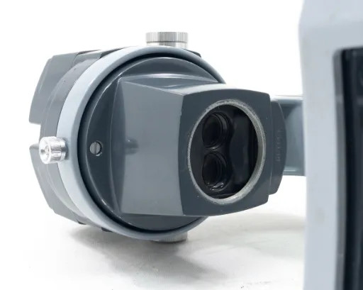 American Optical AO 569 zoom body — bottom front view showing objective lens ports