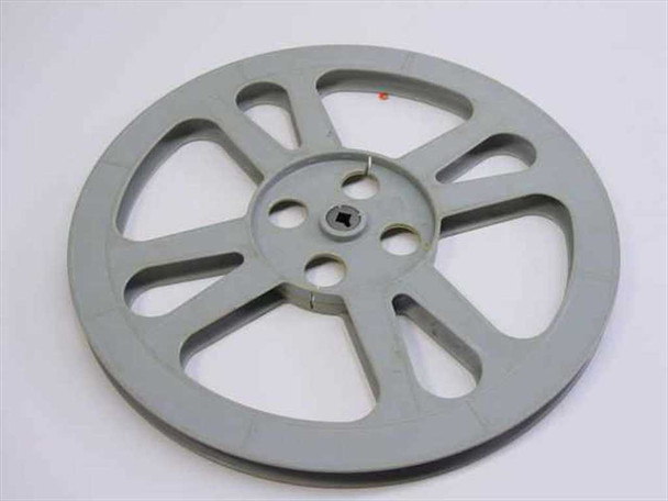 Plastic Reel Corp 16mm film reel, light gray — second front face view, same unit, showing spoke layout and center square hub