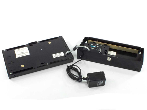 Control Module CMI 2015-T0017 SaveTime terminal shown disassembled – base chassis, top cover removed, and CMI 2061-002A power supply