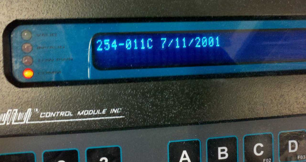 Control Module CMI 2015-T0017 VFD display showing firmware version 254-011C dated 7/11/2001 during self-test