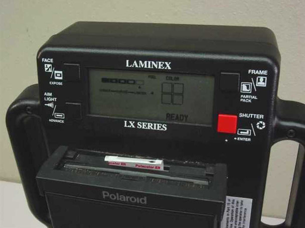 Polaroid Laminex LX400 top control panel showing LCD display reading READY, Laminex LX Series label, frame selector, shutter button, and loaded Polaroid film pack