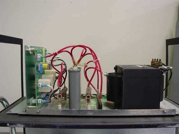 Amray 124-002 Ion Pump Power Supply — internal side view showing PCB, cylindrical HV capacitor, transformer, and red interconnect wiring