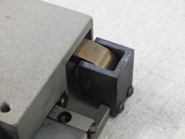 AeroTech ATS-301 close-up of micrometer spindle drive mechanism and brass lead screw nut assembly on stage carriage