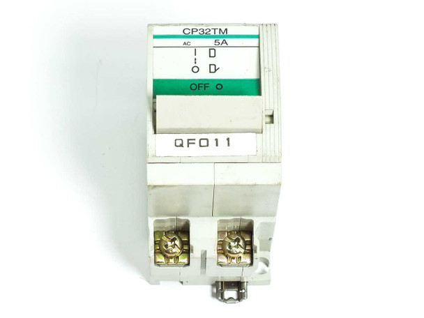 Fuji Electric CP32TM/5 front panel close-up showing CP32TM, 5A AC rating, I/O toggle switch, and OFF position indicator
