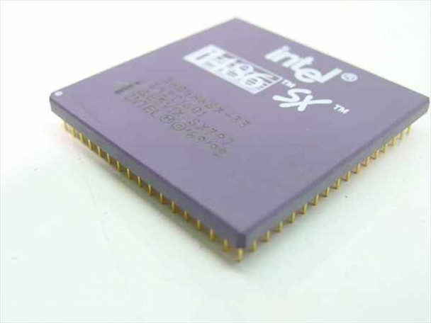 Intel 486SX/33 SX797 processor – angled side view showing ceramic package, gold pins, and top label markings